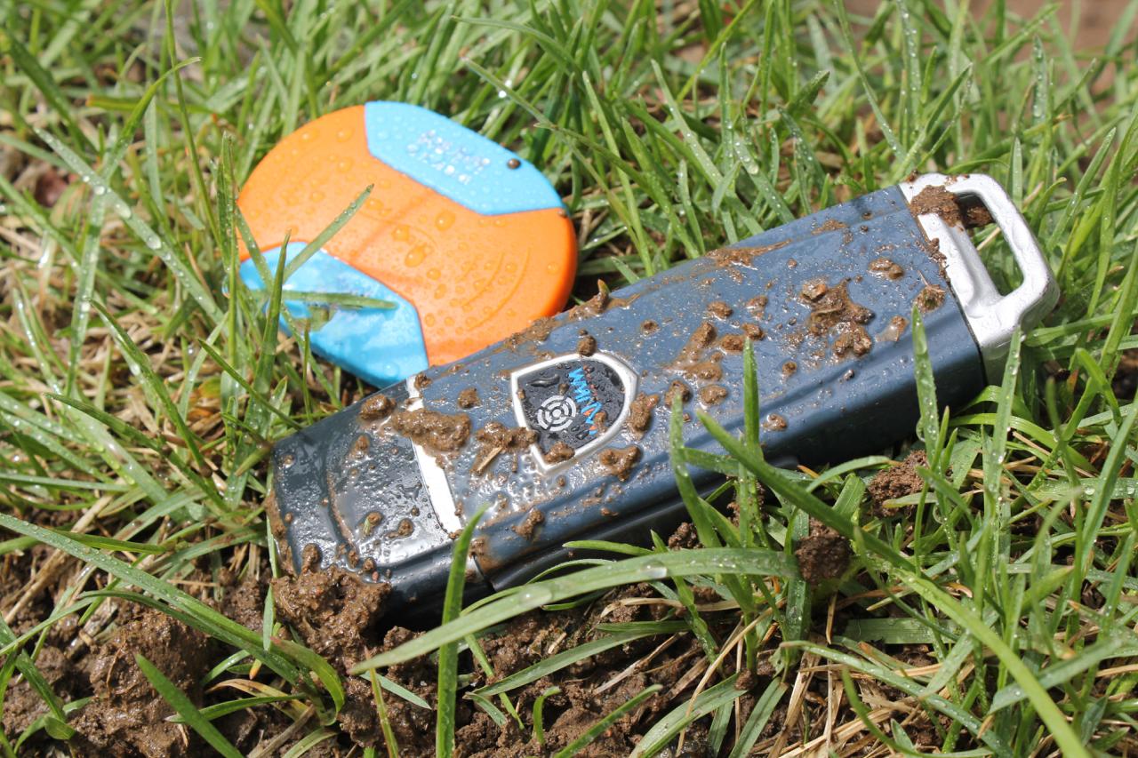 JWM device on wet grass with mud